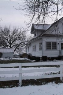 A picture of the Alexander House in the winter. 